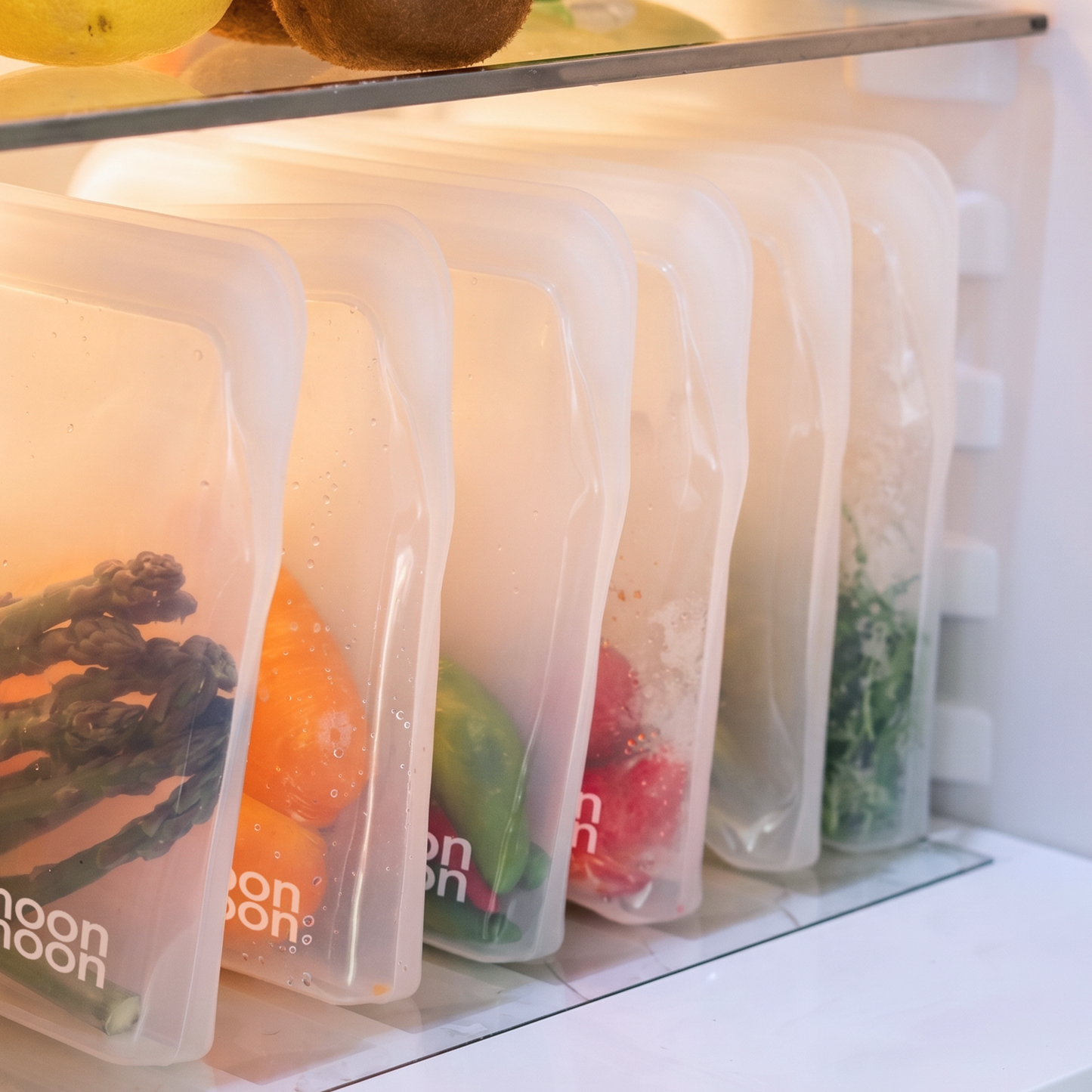 clear reusable silicone storage set, space saving freezer bags, stackable fridge organisation hacks, clear slim food pouches, flat profile meal prep bags, airtight leftover storage containers, neat kitchen drawer sorting, ziploc alternative uk