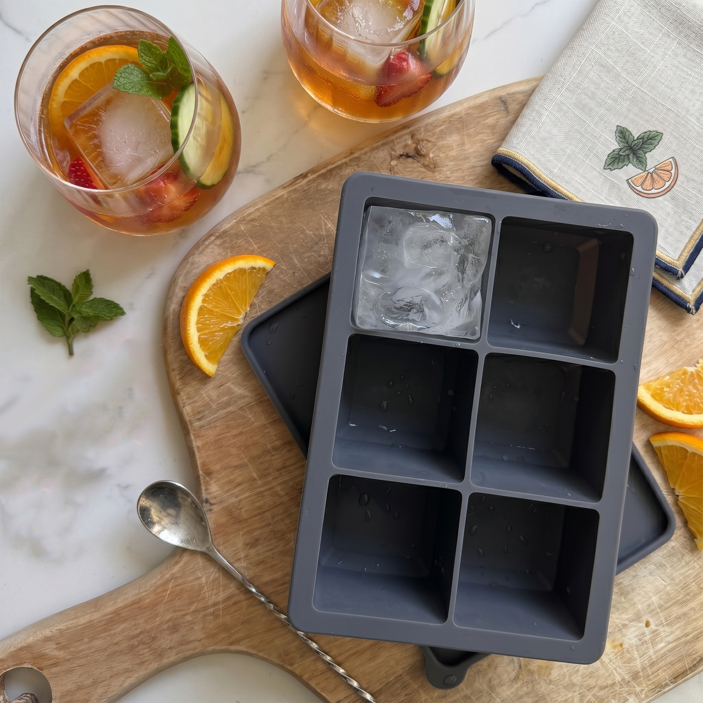 giant ice cube tray, large ice cube tray, jumbo ice cube tray, silicone ice cube tray, extra large ice cube mould, whisky ice cube tray, cocktail ice cube tray, large ice mould, big ice cube tray, reusable ice cube tray, BPA free ice cube tray, giant ice cube mould, oversized ice cube tray, square ice cube tray, slow melting ice cubes, giant ice cube tray for whisky, large silicone ice cube tray with lid