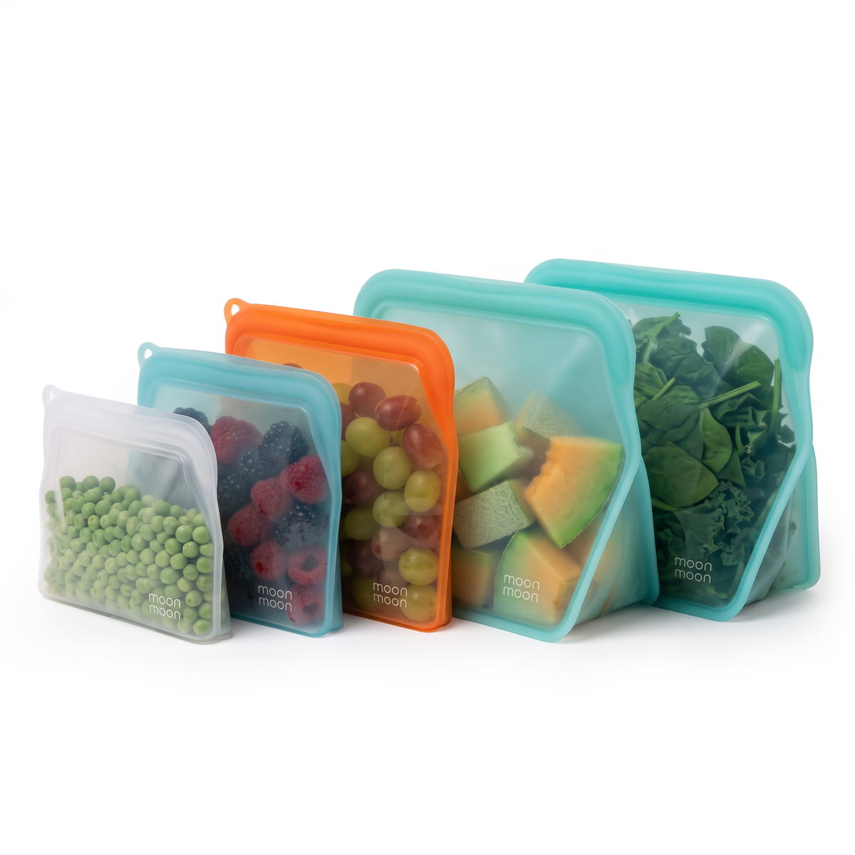 Five moonmoon reusable silicone storage bags in different sizes, shown filled with food items like peas, berries, grapes, melon, and spinach. The bags have translucent teal, orange, and clear silicone walls.